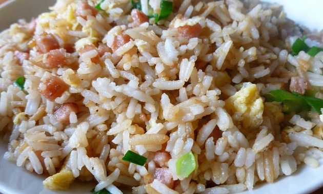 A close up photo of fried rice.