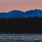 Scenic shot of a lake and mountains