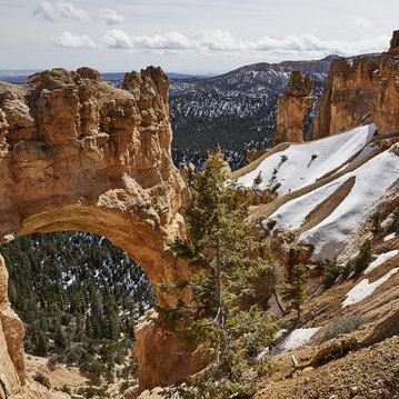 Snow at The Bridge, an arch created by erosion.