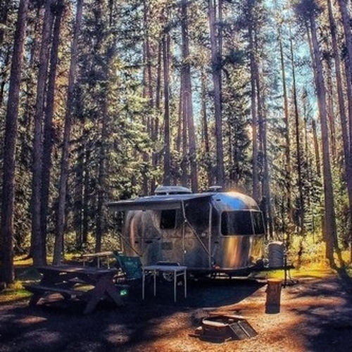 Banff Alberta photo contest entry - RV in a treed in site