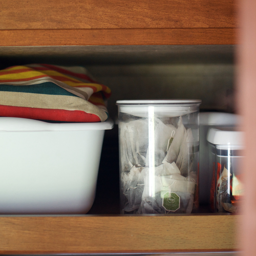 Storing items in bins makes it easier to access stored pieces and helps contain items during travel. 