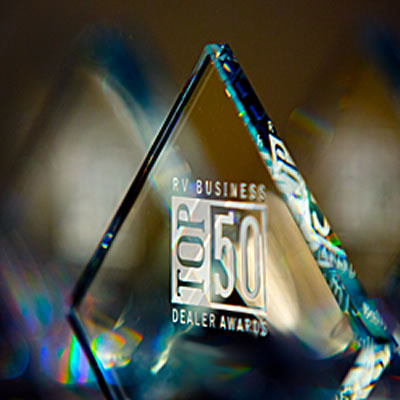 Close-up of RV Business Top 50 Dealer award. 