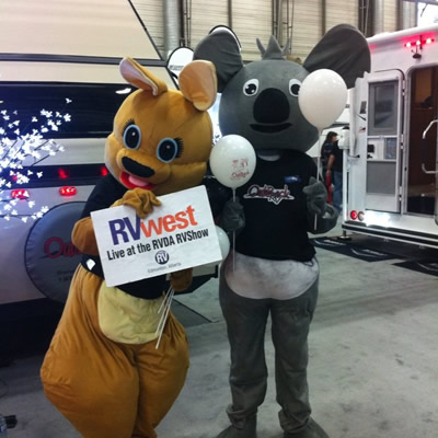 Having fun at the Edmonton RV show with the show mascots. 