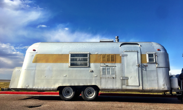 The Tin Can pulled over in a parking lot in Wyoming on our way to Yellowstone in September.