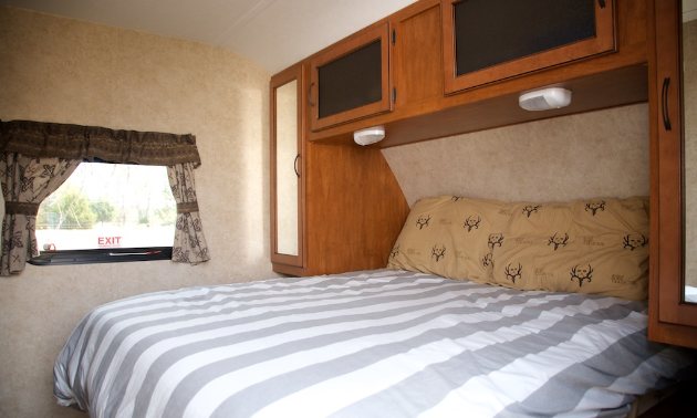 The queen bed in the Bryens' new 2013 camper.