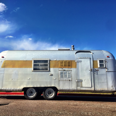 The Tin Can pulled over in a parking lot in Wyoming on our way to Yellowstone in September.