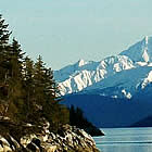 mountains and trees by a lake in Skagway