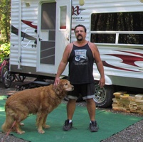 Greg Mykytiuk and his dog Bear enjoying the quiet campsite at Mount Fernie Provincial Park. 