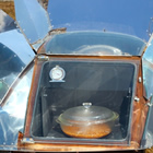 Solar oven cooking dinner.