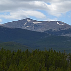 plains with high peaks in the distance