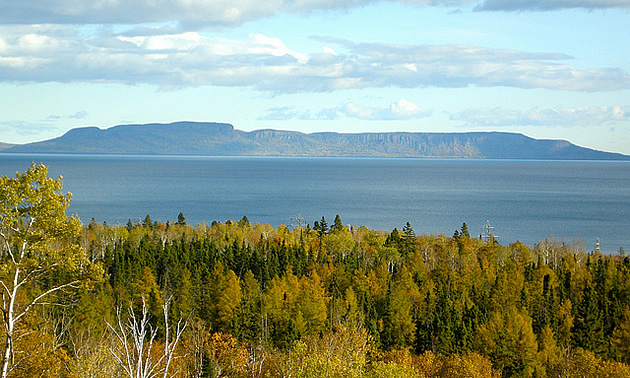 view of a land formation over water