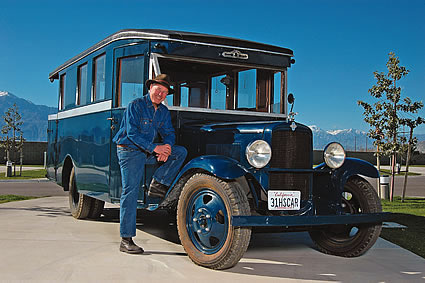 Man with a vintage trailer