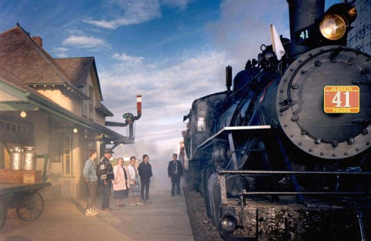 An old steam train stopped at the station Alberta Prairie Railway.