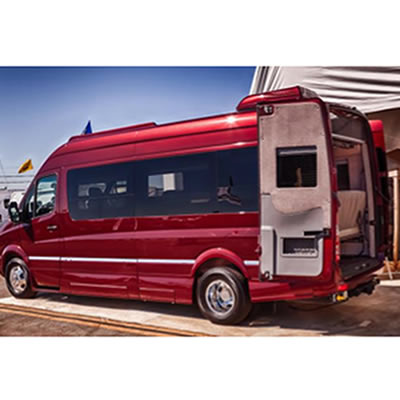 Picture of red RoadTrek RV. 