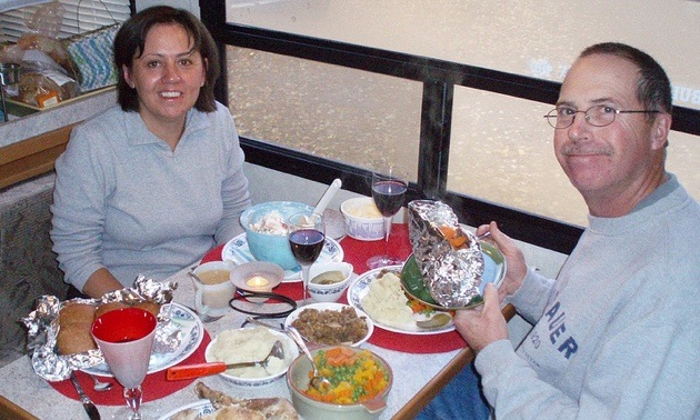 John and Teri Vallevand enjoy a turkey dinner in their motorhome at Elk Island National Park.