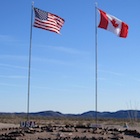 Canadian and American flags in the Valley of Names near Yuma, Arizona