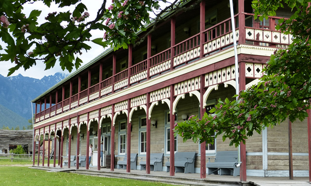A large brightly coloured heritage building. 