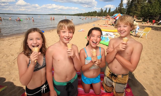 Enjoy an ice cream at nearby Waskesiu, the area's commercial hub, a short hop from Namekus Lake, Saskatchewan.