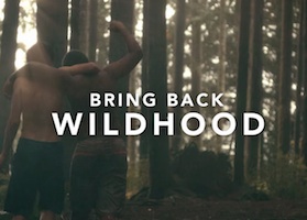 2 boys walking through a shaded forest with their arms over each other's shoulders. The words Bring back the Wildhood have been overlayed the photo. 