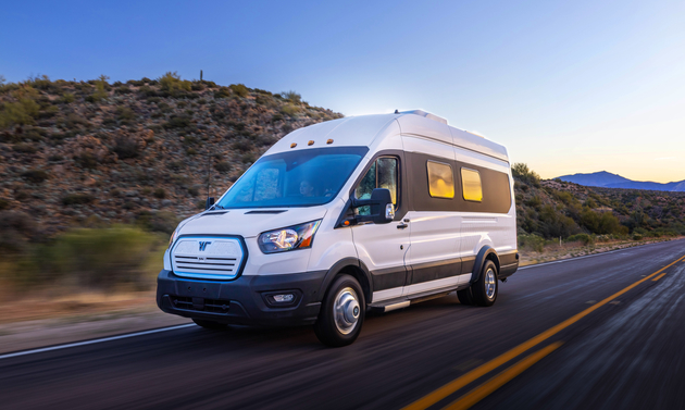 electric Winnebago driving down the road