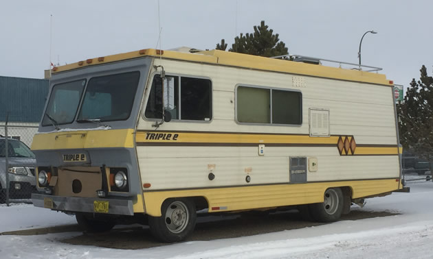 A circa 1970's Triple E motorhome with yellow stripes.