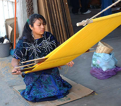 artisan creating loomwork